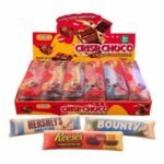 Disponible chez Alghandour Market à Casablanca ━━━━━━━━━━━━━━━━━━━━━━━━━━━━━━━━━━━━━━ SEO Title Crisp Choco Squishy Anti-Stress – Jouet Antistress Trompe-l’Œil Chocolat Tablette et Barres | Prix Maroc ━━━━━━━━━━━━━━━━━━━━━━━━━━━━━━━━━━━━━━ Description courte Chez Alghandour Market, découvrez le Crisp Choco Squishy Anti-Stress, un jouet amusant en forme de tablette de chocolat ou de barre chocolatée. Son design trompe-l’œil imite une gourmandise pour un effet original et ludique. Facile à manipuler et à presser, il est idéal pour se divertir, occuper les mains et offrir un petit cadeau amusant. ━━━━━━━━━━━━━━━━━━━━━━━━━━━━━━━━━━━━━━ Description longue optimisée SEO – Maroc Le Crisp Choco Squishy Anti-Stress est un jouet sensoriel au design gourmand, inspiré des tablettes et des barres de chocolat. Son apparence réaliste et son format amusant en font un accessoire original pour les amateurs de gadgets ludiques et de petits objets insolites. À presser et à manipuler selon les caractéristiques du modèle, ce squishy peut accompagner les pauses au travail, les moments de détente ou les activités de loisirs. Il convient également comme petite idée cadeau pour les amateurs d’accessoires originaux. Vous recherchez un jouet antistress au Maroc ou un squishy en forme de chocolat à Casablanca ? Le Crisp Choco Squishy séduit par son apparence trompe-l’œil et son côté amusant. ━━━━━━━━━━━━━━━━━━━━━━━━━━━━━━━━━━━━━━ Présentation du produit Le Crisp Choco Squishy Anti-Stress est un jouet à manipuler qui reprend l’apparence d’une tablette ou d’une barre chocolatée. Il associe un style gourmand à un concept ludique, sans être un véritable produit alimentaire. ━━━━━━━━━━━━━━━━━━━━━━━━━━━━━━━━━━━━━━ Description et expérience - Design trompe-l’œil inspiré du chocolat. - Forme originale de tablette ou de barre chocolatée, selon le modèle. - Jouet à presser et à manipuler pour une activité sensorielle. - Format pratique pour les loisirs et les pauses. - Idée cadeau amusante pour les amateurs de gadgets originaux. La texture, la souplesse et le temps de retour à la forme initiale peuvent varier selon le modèle. ━━━━━━━━━━━━━━━━━━━━━━━━━━━━━━━━━━━━━━ Utilisations - Manipuler le jouet pendant les pauses. - Découvrir une texture sensorielle ludique. - Ajouter un accessoire original à une collection de squishies. - Offrir un petit cadeau amusant pour un anniversaire ou une occasion spéciale. ━━━━━━━━━━━━━━━━━━━━━━━━━━━━━━━━━━━━━━ Mode d’utilisation Pressez doucement le squishy avec les mains, puis relâchez-le. Évitez de le couper, de le percer ou de le placer près d’une source de chaleur. Respectez les consignes d’entretien indiquées sur l’emballage. ━━━━━━━━━━━━━━━━━━━━━━━━━━━━━━━━━━━━━━ Pour qui ? Ce jouet peut plaire aux enfants, aux adolescents et aux adultes qui aiment les objets sensoriels et les gadgets originaux. Pour les jeunes enfants, vérifiez l’âge recommandé sur l’emballage et utilisez le produit sous la surveillance d’un adulte si nécessaire. ━━━━━━━━━━━━━━━━━━━━━━━━━━━━━━━━━━━━━━ Format et conditionnement Jouet antistress de style squishy, avec un design inspiré d’une tablette ou d’une barre de chocolat. La taille, la couleur, la texture et le conditionnement dépendent de la variante disponible. ━━━━━━━━━━━━━━━━━━━━━━━━━━━━━━━━━━━━━━ Composition et précautions La matière exacte n’étant pas précisée, consultez l’emballage pour connaître la composition et les consignes de sécurité. Ce produit est un jouet et non un aliment. Ne pas avaler. Tenir éloigné des jeunes enfants si de petites pièces peuvent se détacher. ━━━━━━━━━━━━━━━━━━━━━━━━━━━━━━━━━━━━━━ Points forts - Apparence originale de chocolat. - Style trompe-l’œil amusant. - Manipulation ludique et sensorielle. - Convient comme petit cadeau original. - Gadget facile à intégrer aux loisirs du quotidien. ━━━━━━━━━━━━━━━━━━━━━━━━━━━━━━━━━━━━━━ FAQ – Questions fréquentes Le Crisp Choco Squishy est-il du vrai chocolat ? Non, il s’agit d’un jouet décoratif et antistress, pas d’un produit alimentaire. À quoi sert ce squishy ? Il est conçu pour être pressé et manipulé pour le plaisir sensoriel et les moments de détente. Est-il adapté aux enfants ? Cela dépend de la variante et de l’âge recommandé par le fabricant. Vérifiez l’emballage avant utilisation. Peut-on le laver ? Suivez les instructions d’entretien du fabricant. Évitez de l’immerger ou d’utiliser des produits nettoyants sans indication. Où acheter un Crisp Choco Squishy au Maroc ? Vous pouvez rechercher ce jouet original chez Alghandour Market à Casablanca, selon la disponibilité du modèle. ━━━━━━━━━━━━━━━━━━━━━━━━━━━━━━━━━━━━━━ Description en arabe لعبة Crisp Choco Squishy Anti-Stress هي لعبة مسلية بتصميم يشبه لوح الشوكولاتة أو أصابع الشوكولاتة، مع مظهر خداعي لطيف يجعلها تبدو كأنها حلوى حقيقية. يمكن الضغط عليها وتحريكها باليد للاستمتاع بتجربة حسية مرحة أثناء أوقات الفراغ. إنها فكرة هدية صغيرة ومميزة لمحبي الألعاب الغريبة والإكسسوارات المسلية. المنتج لعبة وليس شوكولاتة للأكل. ━━━━━━━━━━━━━━━━━━━━━━━━━━━━━━━━━━━━━━ English Description Crisp Choco Squishy Anti-Stress is a playful sensory toy designed to look like a chocolate bar or chocolate tablet. Its realistic, candy-inspired appearance makes it a fun novelty item to squeeze and handle during breaks or leisure time. It can also make a quirky little gift for fans of squishy toys and unusual gadgets. This is a toy, not real chocolate. ━━━━━━━━━━━━━━━━━━━━━━━━━━━━━━━━━━━━━━ 中文产品描述 Crisp Choco Squishy Anti-Stress 是一款巧克力造型的趣味解压玩具，外观模仿巧克力板或巧克力棒。它拥有有趣的仿真设计，可用手轻轻按压和把玩，适合休闲时刻使用，也可以作为创意小礼物。请注意：这是一款玩具，并非真正的巧克力食品。 ━━━━━━━━━━━━━━━━━━━━━━━━━━━━━━━━━━━━━━ Mots-clés SEO – Maroc Crisp Choco Squishy Maroc, jouet antistress Maroc, squishy chocolat, jouet trompe-l’œil chocolat, jouet sensoriel, squishy tablette chocolat, squishy barre chocolatée, gadget original Maroc, idée cadeau amusante, jouet antistress Casablanca, acheter squishy au Maroc, Prix Crisp Choco Squishy Maroc. ━━━━━━━━━━━━━━━━━━━━━━━━━━━━━━━━━━━━━━ Disponible chez Alghandour Market à Casablanca